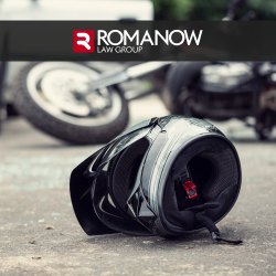 Motorcycle and helmet lying on ground after motorcycle accident