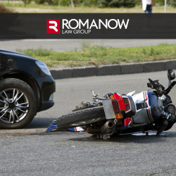 Damaged motorcycle lying on ground after motorcycle accident